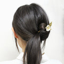 銀椿一本簪（ぎんつばきいっぽんかんざし）